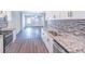 Modern kitchen with granite countertops and stainless steel appliances at 1585 Archer Sw St, Atlanta, GA 30314