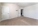 Bedroom with door to bathroom and neutral decor at 4207 Franklin Mill Ln, Loganville, GA 30052