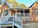 Inviting front porch with white railings and access to home at 342 Mccurry Rd, Stockbridge, GA 30281