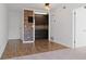 Modern galley kitchen with dark cabinets and wood accent wall at 2805 Northeast Expy # B8, Atlanta, GA 30345