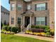 Brick house with landscaped flowerbeds and walkway at 625 Birkdale Dr, Fairburn, GA 30213