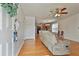 Living room with hardwood floors and ceiling fan at 714 Carlton Pointe Way, Palmetto, GA 30268