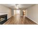 Bright living room with fireplace and hardwood floors at 3358 Orange Blossom Rd, Decatur, GA 30034