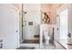Bathroom with a walk-in shower, modern toilet, and stylish decor at 120 Broad Meadows Ln, Fayetteville, GA 30215