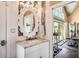 Bathroom with large vanity, unique mirror, and gym access at 120 Broad Meadows Ln, Fayetteville, GA 30215