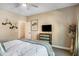 Cozy bedroom with window, neutral tones, and a modern dresser at 120 Broad Meadows Ln, Fayetteville, GA 30215