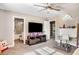 bedroom with TV, desk setup, and en-suite bathroom access at 120 Broad Meadows Ln, Fayetteville, GA 30215
