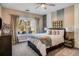 Bright bedroom with a large window, plush bedding, and a TV at 120 Broad Meadows Ln, Fayetteville, GA 30215