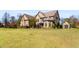 Brick house with a large front yard and landscaping at 120 Broad Meadows Ln, Fayetteville, GA 30215