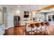 Modern kitchen boasts stainless steel appliances, granite counters, and an island at 120 Broad Meadows Ln, Fayetteville, GA 30215