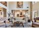Open living room showcasing a view into the kitchen and breakfast area at 120 Broad Meadows Ln, Fayetteville, GA 30215