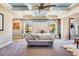 Serene main bedroom with a coffered ceiling, plush bed, and large windows at 120 Broad Meadows Ln, Fayetteville, GA 30215