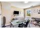 Home office with glass desk, comfortable chair, and window views at 120 Broad Meadows Ln, Fayetteville, GA 30215