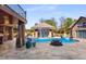 Resort-style pool with multiple water features and fire pit at 120 Broad Meadows Ln, Fayetteville, GA 30215
