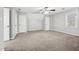 Large bedroom with carpet and multiple closets at 245 Brookclear Ln, Fayetteville, GA 30215