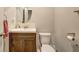 Clean bathroom with dark brown vanity and subway tile at 4155 Eliza Dr, Lithonia, GA 30038