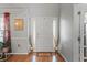 Inviting foyer with hardwood floors and decorative vases at 2773 Saddle Horn Pl, Snellville, GA 30039