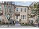 Brick townhouse exterior with a front door and landscaping at 3219 Bartee Walk, Suwanee, GA 30024