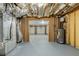 Unfinished basement area with access to garage at 6576 Snowbird Ln, Douglasville, GA 30134