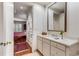 Bright bathroom with a vanity, a large mirror, and access to bedroom at 1717 N Decatur Ne Rd # 214, Atlanta, GA 30307