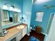 Bathroom with a vanity and shower/tub combo at 75 Briar Patch Rd, Covington, GA 30014