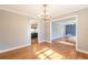 Spacious dining room with hardwood floors and chandelier at 3171 Beech Dr, East Point, GA 30344