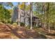 House with screened porch and deck overlooking wooded area at 730 Melanie Ct, Canton, GA 30115