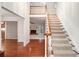 Two-story entryway with hardwood floors and staircase at 730 Melanie Ct, Canton, GA 30115