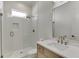 Clean bathroom with a glass shower, updated vanity, and modern mirror at 522 Hope Hollow Ln, Loganville, GA 30052