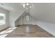 Bright bonus room with hardwood floors and multiple windows at 522 Hope Hollow Ln, Loganville, GA 30052