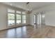 Formal dining room with hardwood floors, chandelier and large windows at 522 Hope Hollow Ln, Loganville, GA 30052