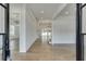 Bright and spacious entryway with hardwood floors and a view through to the living room at 522 Hope Hollow Ln, Loganville, GA 30052