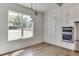 Kitchen nook with built-in wall cabinets and hardwood floors at 522 Hope Hollow Ln, Loganville, GA 30052