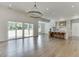 Open concept kitchen boasts stainless steel appliances and an island with seating at 522 Hope Hollow Ln, Loganville, GA 30052