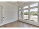 Bright office with hardwood floors, large windows, and a chandelier at 522 Hope Hollow Ln, Loganville, GA 30052