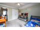 bedroom with crib and twin bed at 260 Shadowbrooke Dr, Loganville, GA 30052