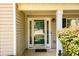 Front entrance with glass door and storm door at 260 Shadowbrooke Dr, Loganville, GA 30052