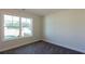 Spacious bedroom with carpet and a window offering a view at 40 Eryn Ter, Covington, GA 30014