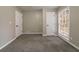 Bedroom with grey carpet and double door closet at 3365 Canary Lake Dr, Duluth, GA 30096