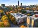 Aerial view of a condo building with city skyline in background at 384 Ralph Mcgill Blvd # 313, Atlanta, GA 30312