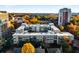 Aerial view of a modern apartment building with fall foliage at 384 Ralph Mcgill Blvd # 313, Atlanta, GA 30312