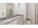 Elegant bathroom with granite double vanity and walk-in shower at 384 Ralph Mcgill Blvd # 313, Atlanta, GA 30312