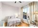 Cozy bedroom with hardwood floors and large window at 384 Ralph Mcgill Blvd # 313, Atlanta, GA 30312