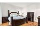 Spacious bedroom with hardwood floors and a large dresser at 384 Ralph Mcgill Blvd # 313, Atlanta, GA 30312