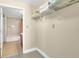 Walk-in closet with wire shelving and access to an ensuite bathroom at 230 E Ponce De Leon Ave # 516, Decatur, GA 30030