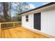 Wooden deck with access to backyard at 9148 Homewood Dr, Riverdale, GA 30274