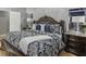 Primary bedroom with a king-size bed and ornate headboard at 2745 Chandler Grove Dr, Buford, GA 30519