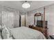 Spacious Primary bedroom with a four-poster bed and ensuite bathroom at 2745 Chandler Grove Dr, Buford, GA 30519