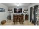 Basement wet bar with seating and ample storage at 2745 Chandler Grove Dr, Buford, GA 30519