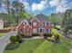 Two-story house with a large yard and driveway at 1151 Ruby Nelson Ct, Lawrenceville, GA 30043
